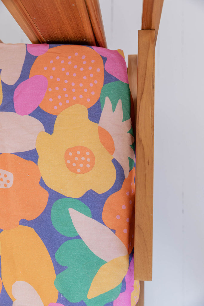 Pink and orange floral fitted cot sheet – Bubbles Lane