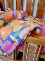 Bright floral linen with yellow linen cot quilt
