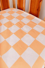 Orange checkers bassinet sheet/ change table cover