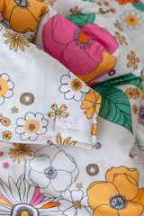 Eden floral with bone linen cot quilt