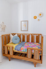 Brittany floral with washed denim blue linen cot quilt