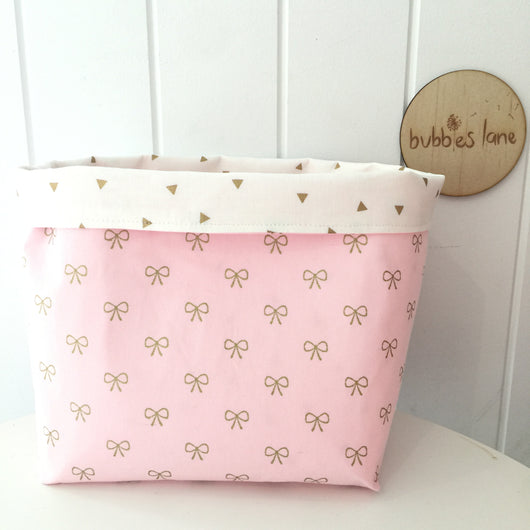 Pink bows with gold triangles fabric basket