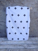 Tossed black triangle, white with black swiss cross, black with white small cross change sheet