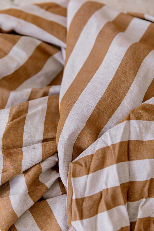 Cinnamon stripe linen cot sheet