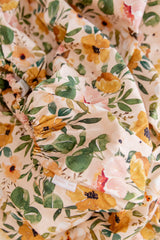 Green and mustard floral fitted cot sheet