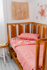 Pink and orange floral with salmon linen cot quilt