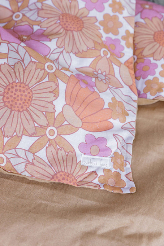 Floral with biscuit linen cot quilt
