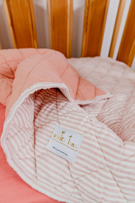 Pink stripe with plain pink quilted linen playmat