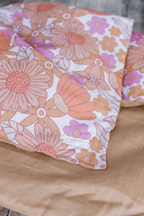 Floral with biscuit linen cot quilt