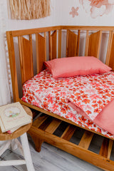 Pink and orange floral with salmon linen cot quilt