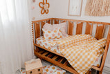 Yellow bold gingham linen with white linen cot quilt