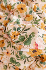 Green and mustard floral fitted cot sheet