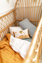 Stonewashed mustard linen with white linen cot quilt