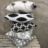 Black chipper, black dandelion, black link, grey floral, grey triangle cushion cover